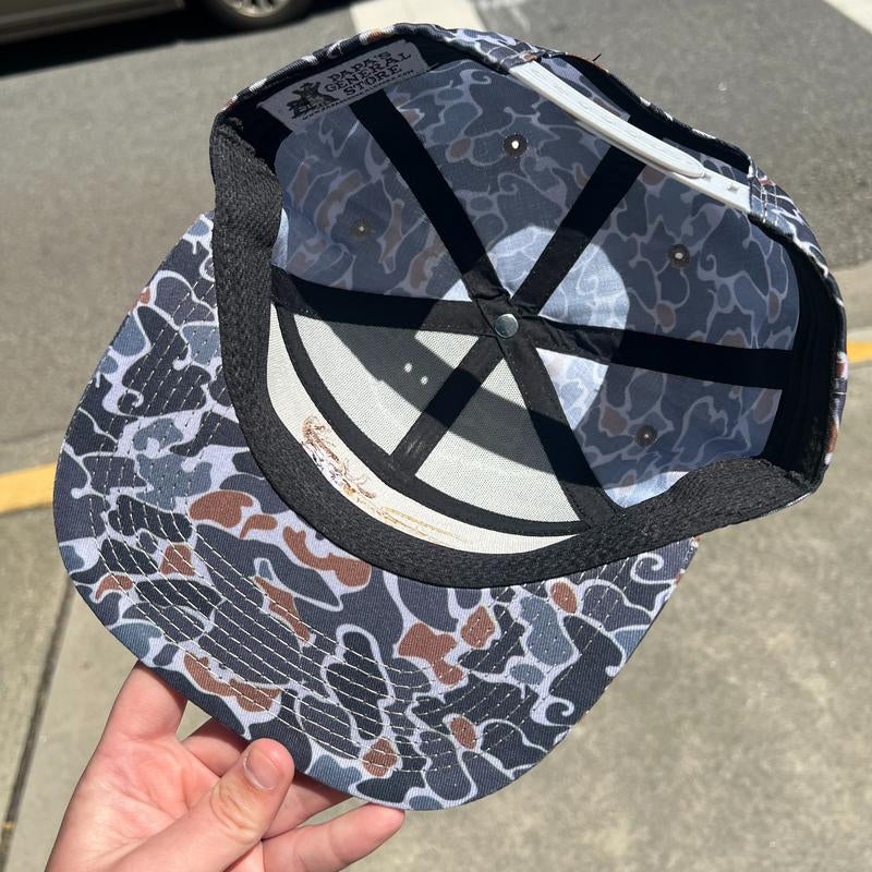 The Bedded Buck Black Old School Camo 7 Panel PGS Trucker Hat